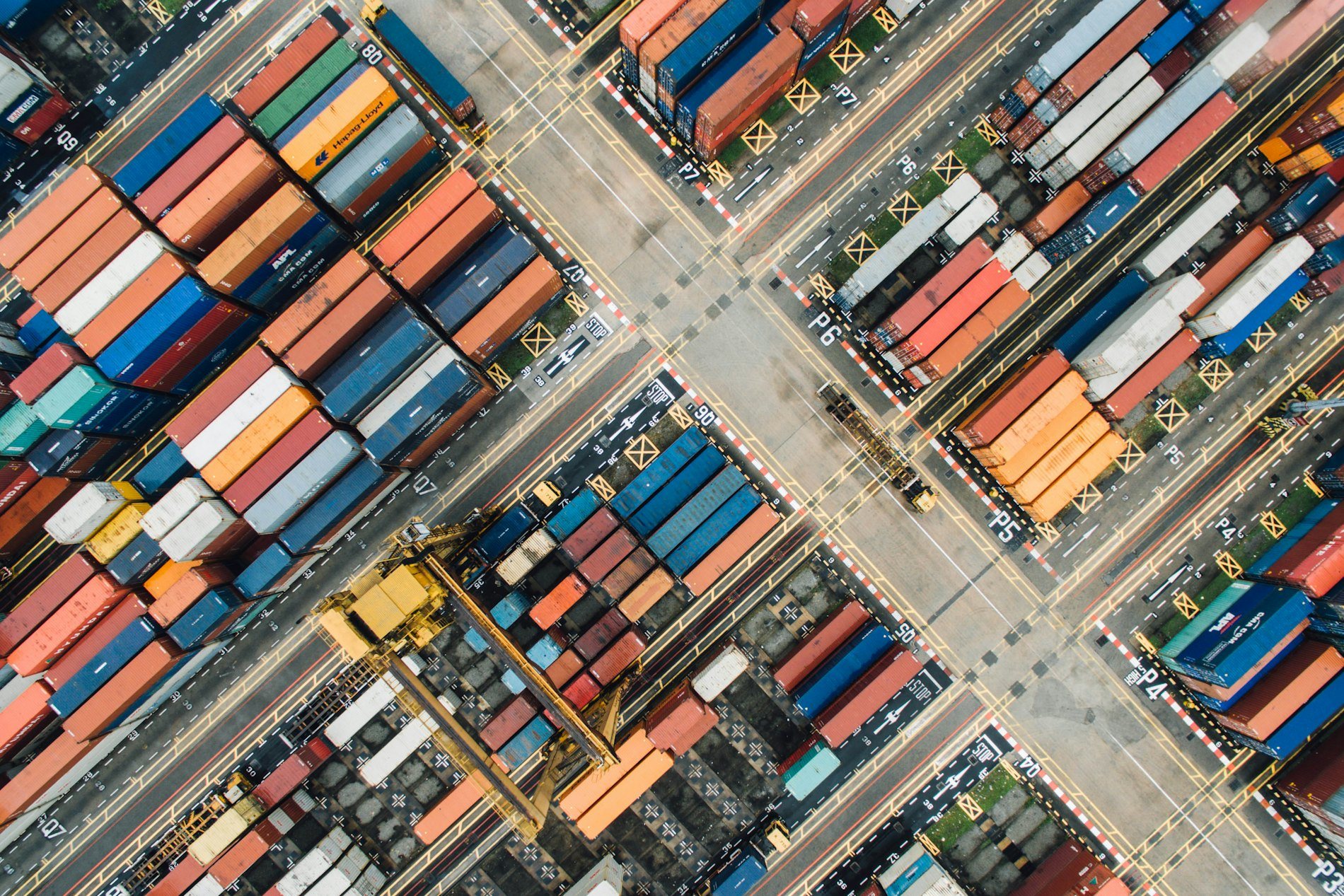 Stacked freight containers in a shipping yard